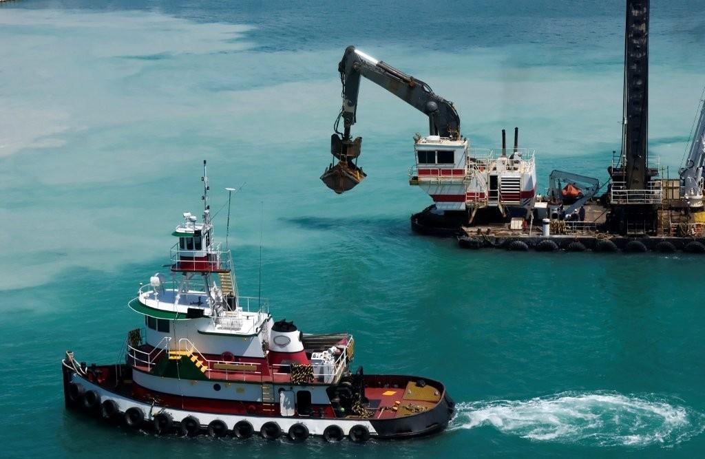 tugs and dredges